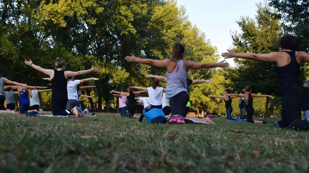 Group of women practicing yoga together in Sicily
